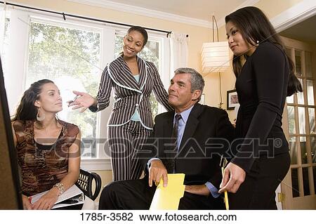 Women entrepreneurs in a business meeting View Large Photo Image Stock Image - Women entrepreneurs in a business meeting. Fotosearch
