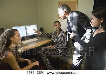 Women entrepreneurs in a business meeting View Large Photo Image Stock Image - Women entrepreneurs in a business meeting. Fotosearch