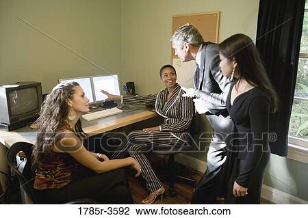 Women entrepreneurs in a business meeting View Large Photo Image Stock Image - Women entrepreneurs in a business meeting. Fotosearch