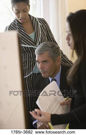 Women entrepreneurs in a business meeting View Large Photo Image Stock Image - Women entrepreneurs in a business meeting. Fotosearch