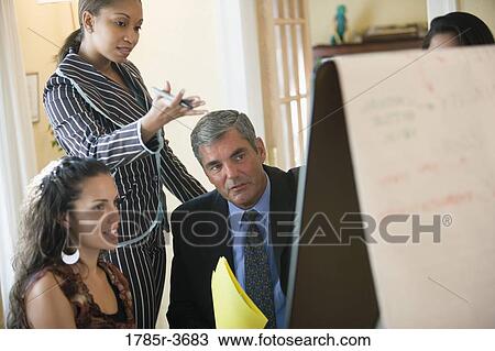 Women entrepreneurs in a business meeting View Large Photo Image Stock Image - Women entrepreneurs in a business meeting. Fotosearch