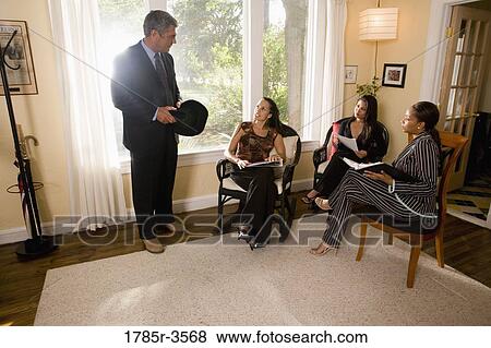 Women entrepreneurs in a business meeting View Large Photo Image Stock Photo - Women entrepreneurs in a business meeting. Fotosearch