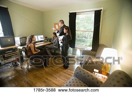 Stock Photo - Women entrepreneurs in a business meeting. Fotosearch