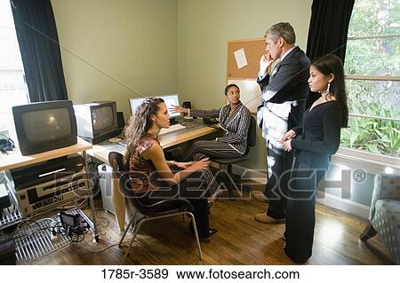 Women entrepreneurs in a business meeting View Large Photo Image Stock Photo - Women entrepreneurs in a business meeting. Fotosearch