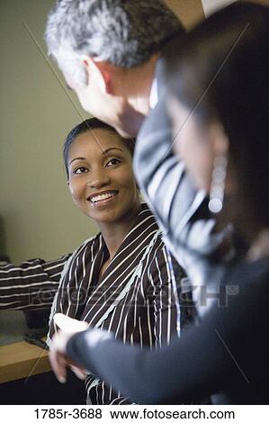 Women entrepreneurs in a business meeting View Large Photo Image Stock Photo - Women entrepreneurs in a business meeting. Fotosearch