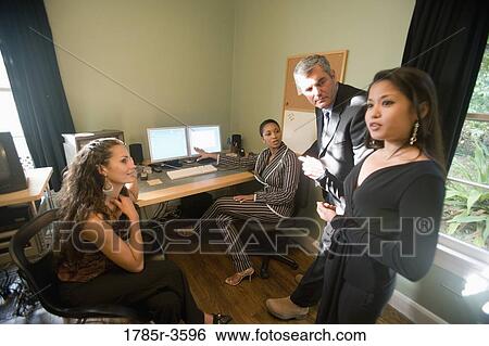 Women entrepreneurs in a business meeting View Large Photo Image Stock Photograph - Women entrepreneurs in a business meeting. Fotosearch