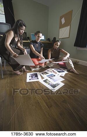 Stock Image - Women entrepreneurs working in office. Fotosearch