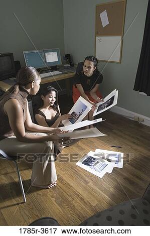 Women entrepreneurs working in office View Large Photo Image Stock Photo - Women entrepreneurs working in office. Fotosearch