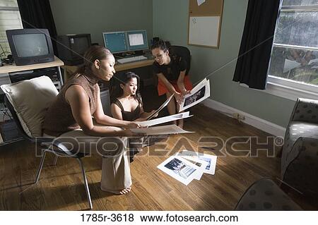 Women entrepreneurs working in office View Large Photo Image Stock Photo - Women entrepreneurs working in office. Fotosearch