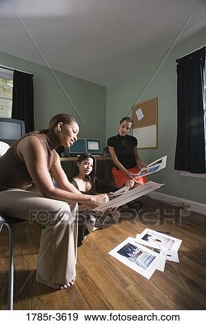 Women entrepreneurs working in office View Large Photo Image Stock Photo - Women entrepreneurs working in office. Fotosearch