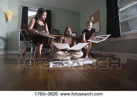 Women entrepreneurs working in office View Large Photo Image Stock Photograph - Women entrepreneurs working in office. Fotosearch