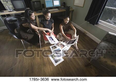 Women entrepreneurs working in office View Large Photo Image Stock Photograph - Women entrepreneurs working in office. Fotosearch