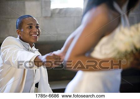 Young bride and groom View Large Photo Image Stock Photograph - Young bride and groom. Fotosearch