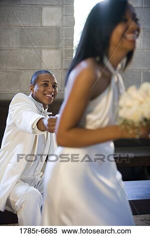 Stock Photography - Young bride and groom. Fotosearch