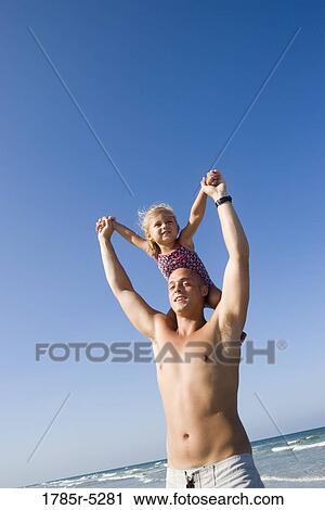 Young father and daughter playing View Large Photo Image Stock Image - Young father and daughter playing. Fotosearch