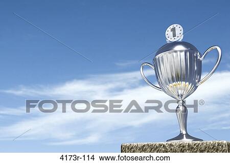 3D composing of 1st prize pocal standing on stone plate in front of blue sky View Large Photo Image Picture - 3D composing of 1st prize pocal standing on stone plate in front of blue sky. Fotosearch