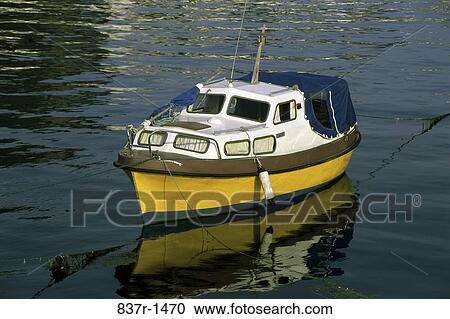Stock Image - Boat in the sea, Alesund, Norway. Fotosearch