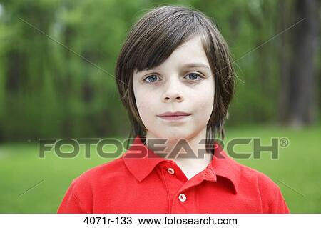 Stock Image - Boy outdoors, portrait. Fotosearch