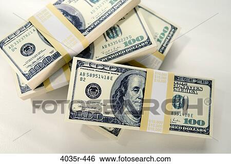 Bundles of one hundred US dollar bills View Large Photo Image Stock Photograph - Bundles of one hundred US dollar bills. Fotosearch