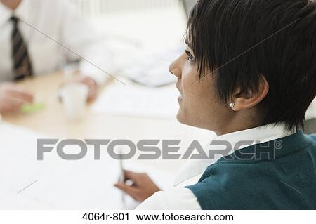 Businesspeople discussing project in boardroom View Large Photo Image Stock Image - Businesspeople discussing project in boardroom. Fotosearch