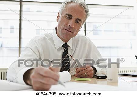 Businesspeople discussing project in boardroom View Large Photo Image Stock Photo - Businesspeople discussing project in boardroom. Fotosearch