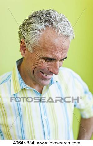 Picture - Cheerful mature businessman. Fotosearch