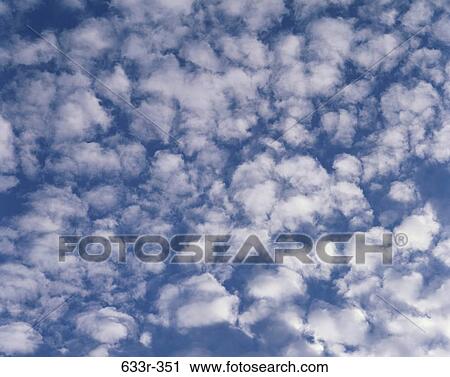 Cirrocumulus clouds in a blue sky View Large Photo Image Stock Image - Cirrocumulus clouds in a blue sky. Fotosearch