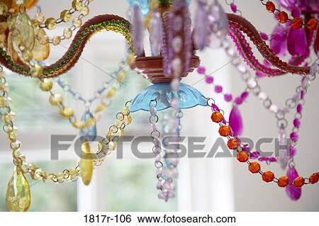 Stock Photograph - Close-up of a colorful glass chandelier. Fotosearch