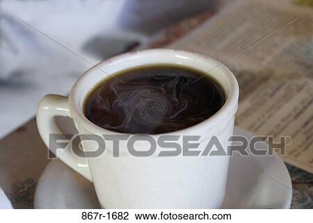 Close-up of a cup of coffee View Large Photo Image Stock Image - Close-up of a cup of coffee. Fotosearch