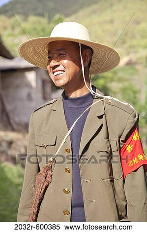 Stock Photography - Close-up of a farmer smiling, Kunming, Yunnan Province, China. Fotosearch