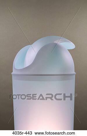 Close-up of a garbage can with swinging lid View Large Photo Image Stock Image - Close-up of a garbage can with swinging lid. Fotosearch