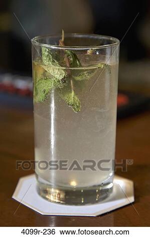 Close-up of a glass of Mojito View Large Photo Image Stock Photograph - Close-up of a glass of Mojito. Fotosearch