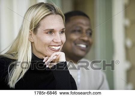 Stock Photograph - Close-up of a mature inter-racial couple. Fotosearch