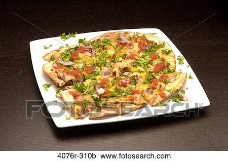 Stock Image - Close-up of a Mexican pizza. Fotosearch
