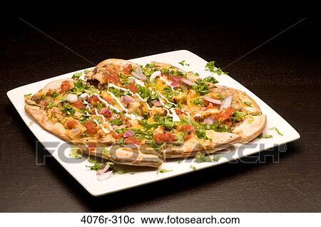 Stock Image - Close-up of a Mexican pizza. Fotosearch