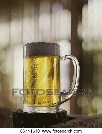 Close-up of a mug of beer View Large Photo Image Stock Image - Close-up of a mug of beer. Fotosearch
