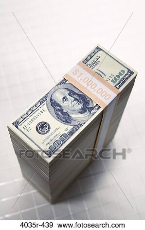 Close-up of a stack of one hundred US dollar bills View Large Photo Image Stock Photo - Close-up of a stack of one hundred US dollar bills. Fotosearch