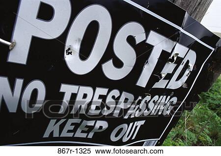 Close-up of a trespassing warning sign View Large Photo Image Stock Photography - Close-up of a trespassing warning sign. Fotosearch
