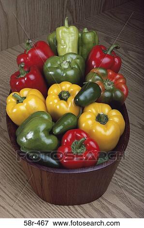 Close-up of assorted bell peppers in a basket View Large Photo Image Stock Photo - Close-up of assorted bell peppers in a basket. Fotosearch