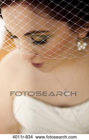 Picture - Close-up of bride with veil. Fotosearch