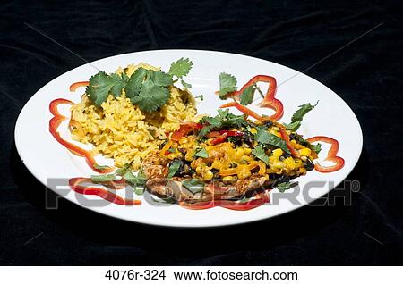 Close up of chicken and rice with corn and peppers View Large Photo Image Picture - Close up of chicken and rice with corn and peppers. Fotosearch