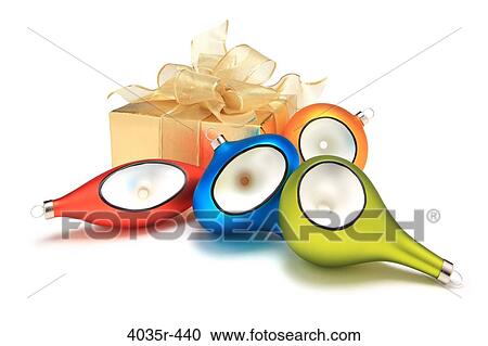 Close-up of Christmas ornaments with a gift View Large Photo Image Stock Image - Close-up of Christmas ornaments with a gift. Fotosearch