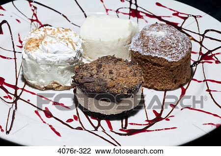 Close up of dessert cakes with chocolate topping View Large Photo Image Stock Image - Close up of dessert cakes with chocolate topping. Fotosearch