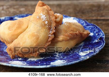Stock Photo - Close-up of empanadas on a plate. Fotosearch
