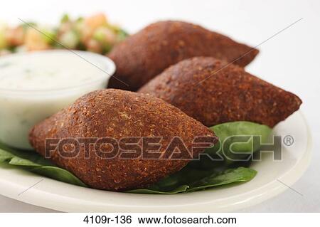 Stock Photograph - Close-up of fried Kibbeh. Fotosearch