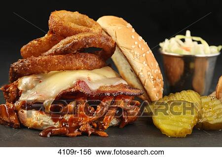 Stock Photograph - Close-up of pulled pork sandwich with coleslaw. Fotosearch