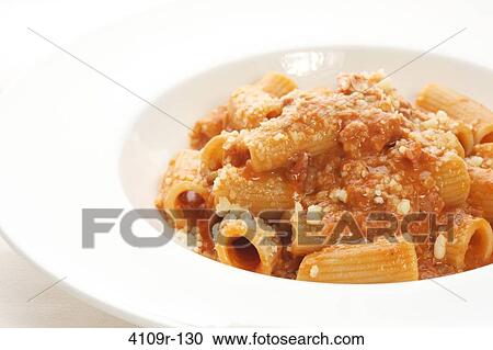 Close-up of Rigatoni pasta served in a bowl View Large Photo Image Stock Image - Close-up of Rigatoni pasta served in a bowl. Fotosearch