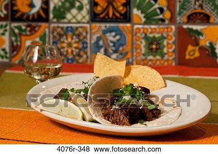 Close up of steak taco and tequila shot View Large Photo Image Stock Photo - Close up of steak taco and tequila shot. Fotosearch