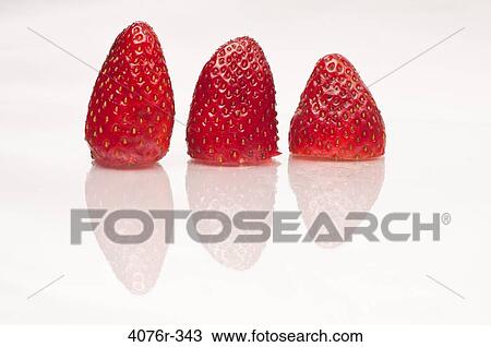Close up of strawberries on white background View Large Photo Image Stock Image - Close up of strawberries on white background. Fotosearch