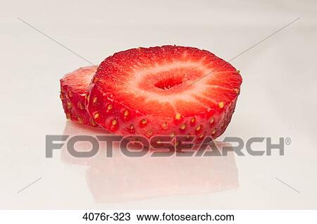 Close up of strawberry slices View Large Photo Image Stock Image - Close up of strawberry slices. Fotosearch